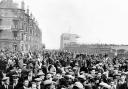 Fans mill about outside the locked gates at Hampden. Inside 146000 more (a British record) were watching the 1937 Cup final between Celtic and Aberdeen. Pic: Herald and Times