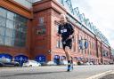 David Smith set off on his marathon trek yesterday from Rangers' Ibrox Stadium