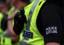 Man arrested after child hit by car on North Glasgow road