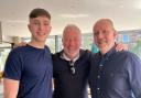 Rangers legend Ally McCoist poses with staff during visit to Glasgow restaurant