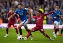 Rangers Ben Davies and Liverpool's Fabio Carvalho (right) during the UEFA Champions League Group A match