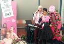Supermarket staff raise thousands for breast cancer charities