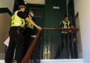 Cops raid Glasgow flat after 'incident' in Edinburgh