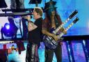 Axl Rose and Slash of Guns N' Roses performing on the Pyramid Stage at the Glastonbury Festival at