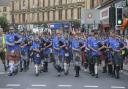 Globally acclaimed pipe band take to the streets of Glasgow