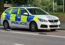 Man caught speeding crashed into police car was distracted by music