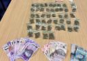 Two due in court after drugs and cash seized in West End
