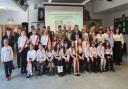 Pupils at Glasgow's Polish Saturday school with military officials at the renaming ceremony