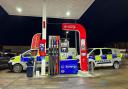 Huge police presence swarms petrol station amid incident