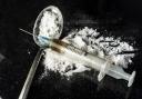 Heroin worth thousands found by police during raid of home