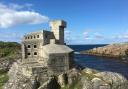 Hermit's Castle overlooks Achmelvich Bay, one of the best beaches in the world