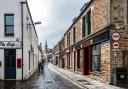 Stromness in Orkney is known for its narrow main street which hugs the coast