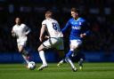 Ipswich Town's Dan Neil (right) and Millwall's Billy Mitchell (centre) battle for the ball during the Sky Bet Championship match at Portman Road, Ipswich. Picture date: Saturday March 21, 2026. PA Photo. Photo credit should read: Ben Whitley/PA