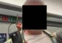 The man was caught taking pictures of the girls on his phone