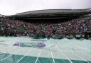 Rain delays play on Wimbledon’s outside courts