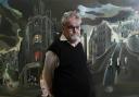 Artist Alasdair Gray pictured in front of his painting 'Cowcaddens' which forms part of the joint exhibition with himself and his late friend, Alasdair Taylor 'The Two Alisdairs'  at the Glasgow School of Art..