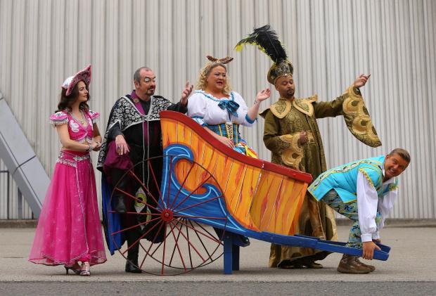 Glasgow Times: Members of the cast of the SEC panto Aladdin pictured at the Armadillo, Glasgow. They are from left- Rachel Flynn (Scherazade), Gavin Mitchell (evil sorcerer Abanazer), Leah MacRae (Mrs Twankey), Brian James Leys (The Emperor) and Gary:Tank Commander