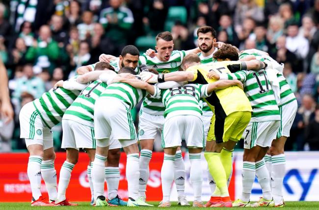 The Celtic players form the huddle on Sunday