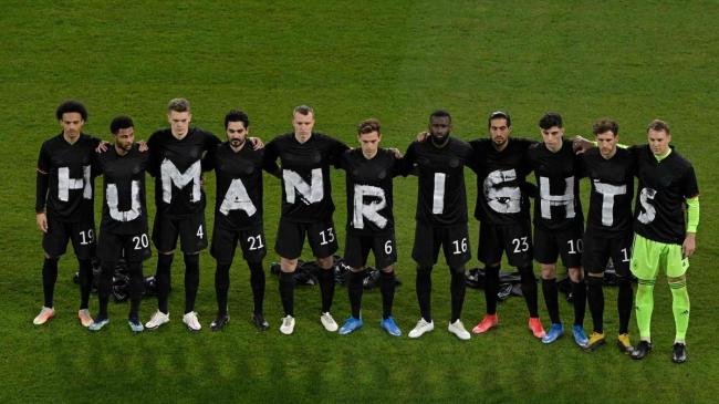 Germany's players protest against human rights abuses in Qatar before a World Cup qualifier.