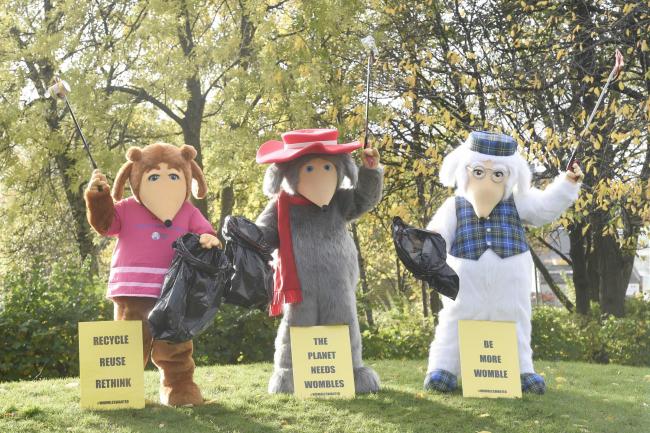 TV icons The Wombles pick litter at a Glasgow park during their COP26 visit
