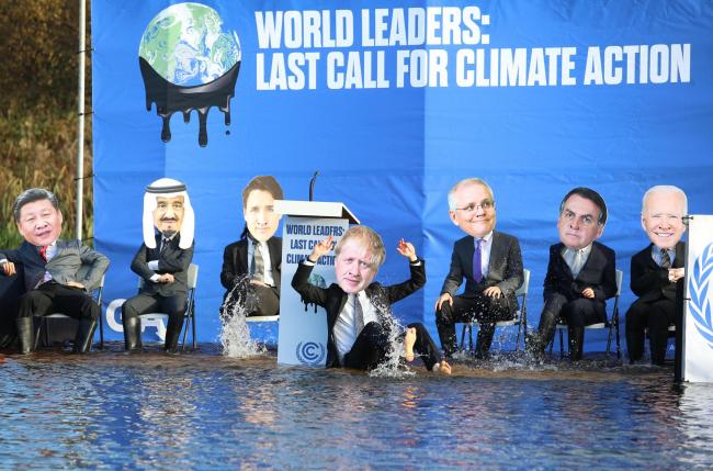World leaders on a sinking platform in the Forth & Clyde canal at Maryhill  Picture: Gordon Terris
