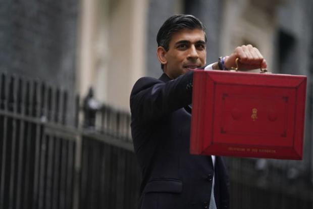 Glasgow Times: Chancellor Rishi Sunak announced the Universal Credit taper rate change in the Budget (Victoria Jones/PA)