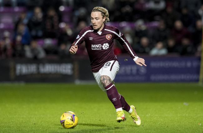 Watch: Hearts winger Barrie McKay appears to be struck by bottle thrown by Celtic fans
