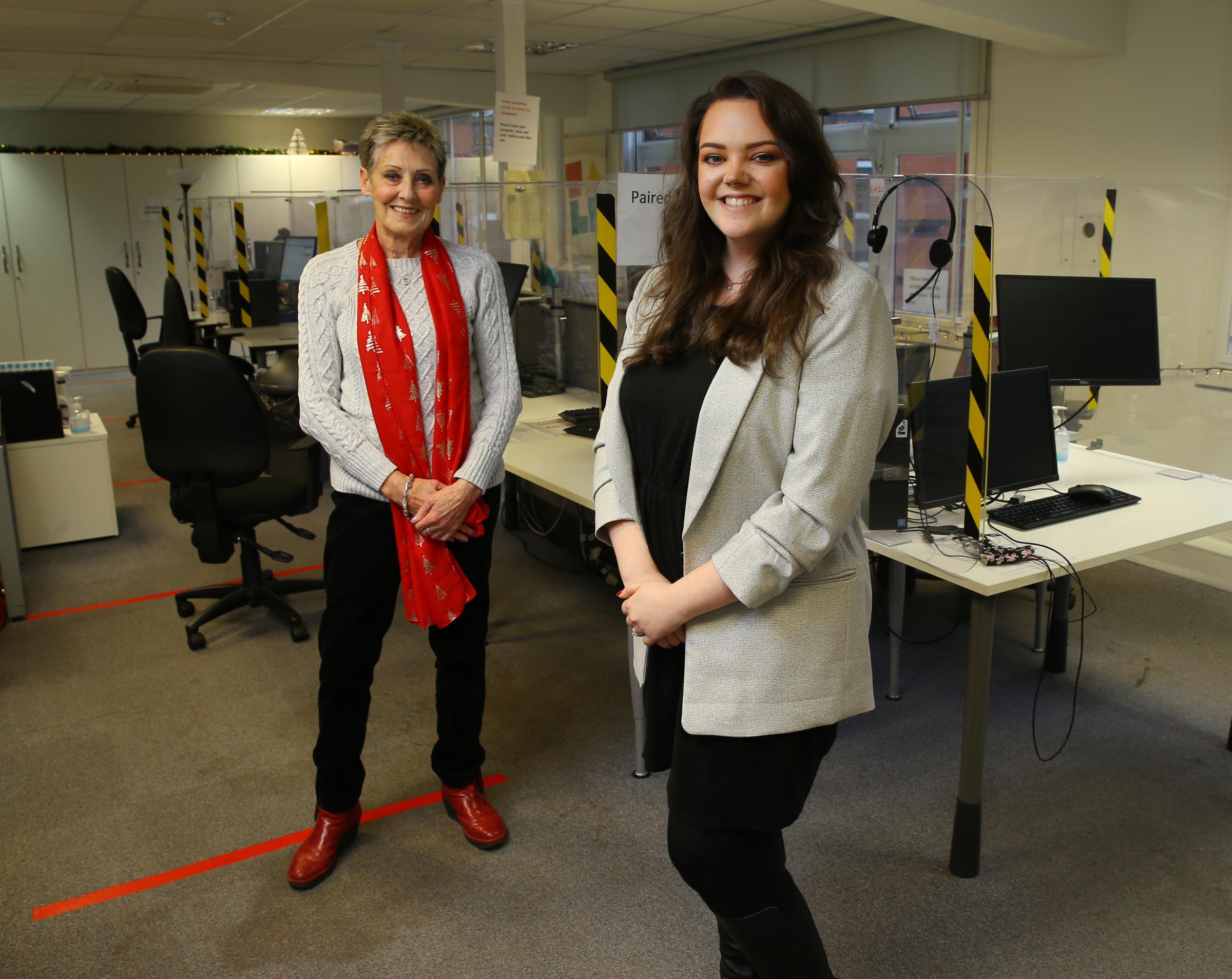 Meg Robertson, left, Childline volunteer pictured with Lauren Burke at right, Childline team manager. They are pictured at the Childline Glasgow base. Photograph by Colin Mearns 16 December 2021 For Glasgow Times, see story by Ruth Suter
