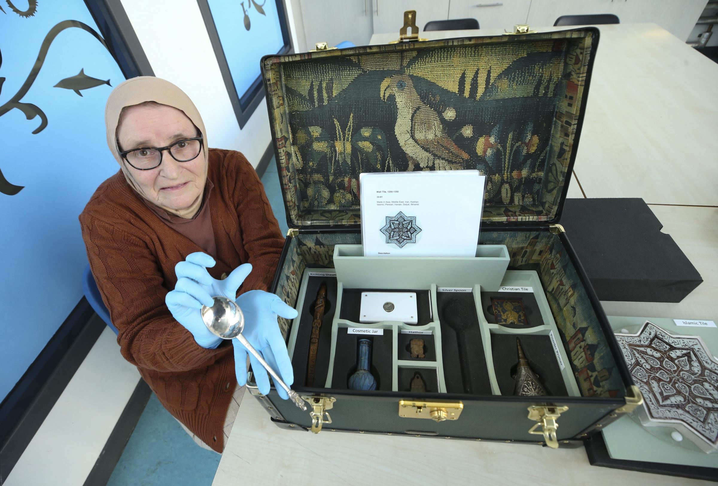 Ann Al Sholi of the community group which helped shape the new handling box displays at the new Burrell Collection with an example of the objects. STY FOTHERINGHAM..Pic Gordon Terris Herald & Times..3/11//21.