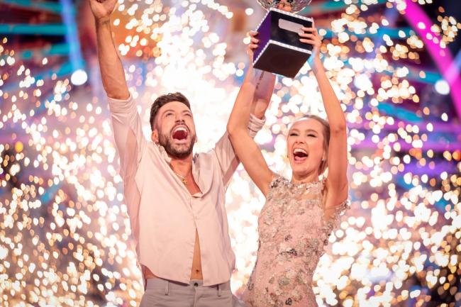 Rose Ayling-Ellis and Giovanni Pernice with the glitterball trophy during the final of Strictly Come Dancing 2021 Picture: Guy Levy/BBC/PA Wire