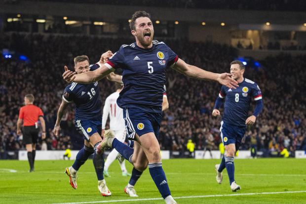 Scotland's John Souttar celebrates after scoring to make it 1-0 during a FIFA World Cup Qualifier between Scotland and Denmark at Hampden
