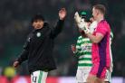Reo Hatate, left, salutes the Celtic support after his Man of the Match-winning debut display against Hibernian