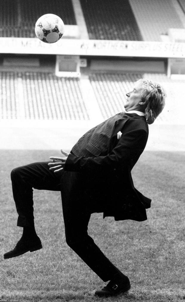 Glasgow Times: Rod Stewart doing keepie uppies before his 1983 Ibrox gig