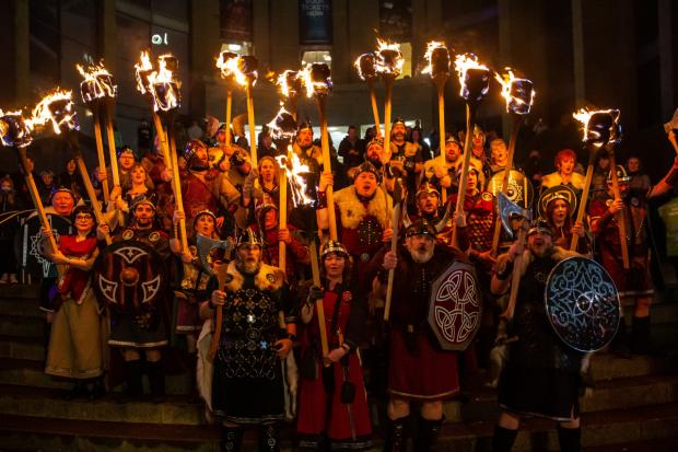 Glasgow Times: Shetland Vikings at the Glasgow Royal Concert hall steps to officially open the Celtic Connections music festival. [Photograph by Colin Mearns]