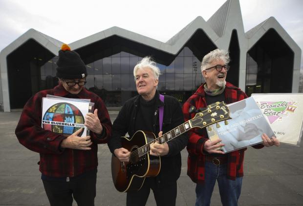 Glasgow Times: Blubells Bobby (Hodgens), left, with David and Ken McCluskey, right, at the opening of a new exhibition dedicated to Glasgow's music store scene at Glasgow's Riverside Museum on Wednesday.  ..Pic Gordon Terris Herald & Times..2/3/22.