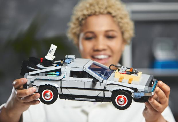 Glasgow Times: A woman holding the LEGO Back to The Future Delorean set. Credit: LEGO