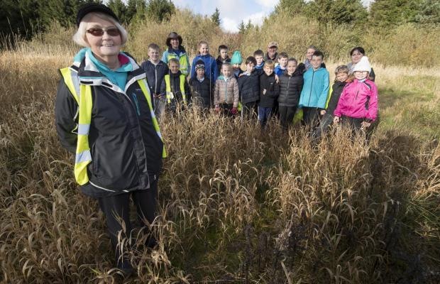 Glasgow Times: Maureen at work with one of the local schools who regularly use the Moss.