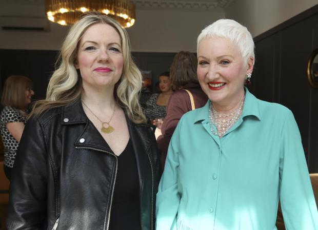 Glasgow Times: Glasgow Times Scots Woman of the Year 2021 nominees Zoe Venditozzi, left, and Claire Mitchell QC at a presentation at the Herald & Times offices in Bath Street thursday...Pic Gordon Terris Herald & Times..31/3/22.