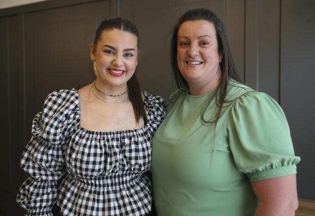 Glasgow Times: Glasgow Times Scots Young Woman of the Year 2021 nominee Meghan Porterfield and mum Mhairi at a presentation at the Herald & Times offices in Bath Street thursday...Pic Gordon Terris Herald & Times..31/3/22.
