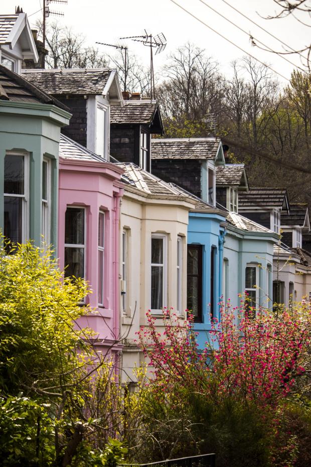 Glasgow Times: Blairhall Avenue, Shawlands, with its characteristic colourful houses. Photo: Sara Paciaroni