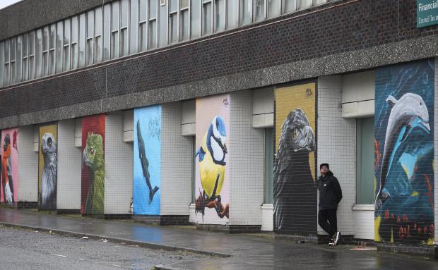 Glasgow Times: Stephen with his murals on the Greenview Street side of the Arcade
