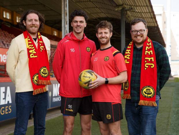 Glasgow Times: Neil Cowan, far left and Alan Aitken at far right, both of whom are involved with Jags For Good. They are pictured at Firhill stadium with Partick Thistle players Ciaran McKenna, left and Ross Docherty at right  Picture: Colin Mearns