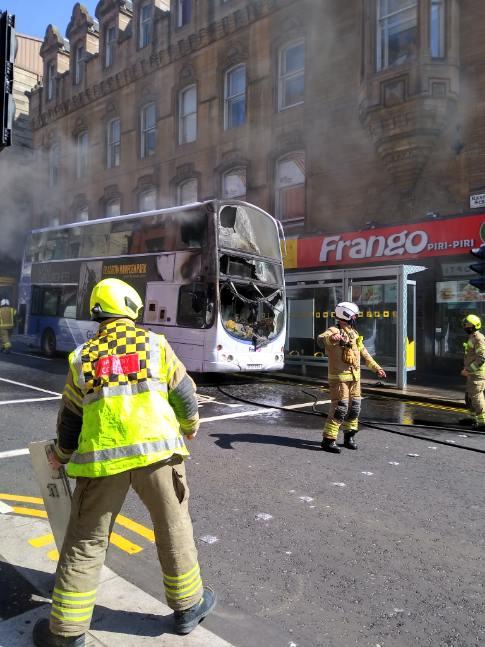 Glasgow Times: A bus is on fire on Glasgow's Renfield Street 
