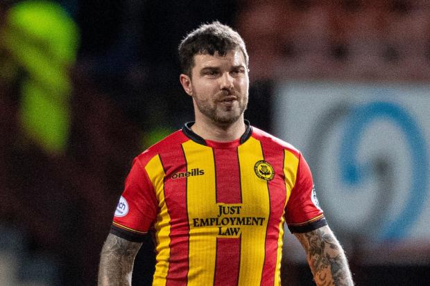 Richard Foster hauled back by Partick Thistle players as defender involved in spat with fan