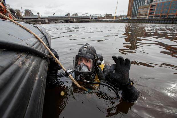 Glasgow Times: Members of the Police Dive and Marine unit pictured on the River Clyde at the Broomielaw in Glasgow. Pictured is police diver Louise Muir...Photograph by Colin Mearns.16 March 2022.For Glasgow Times, see story by Cat Stewart.