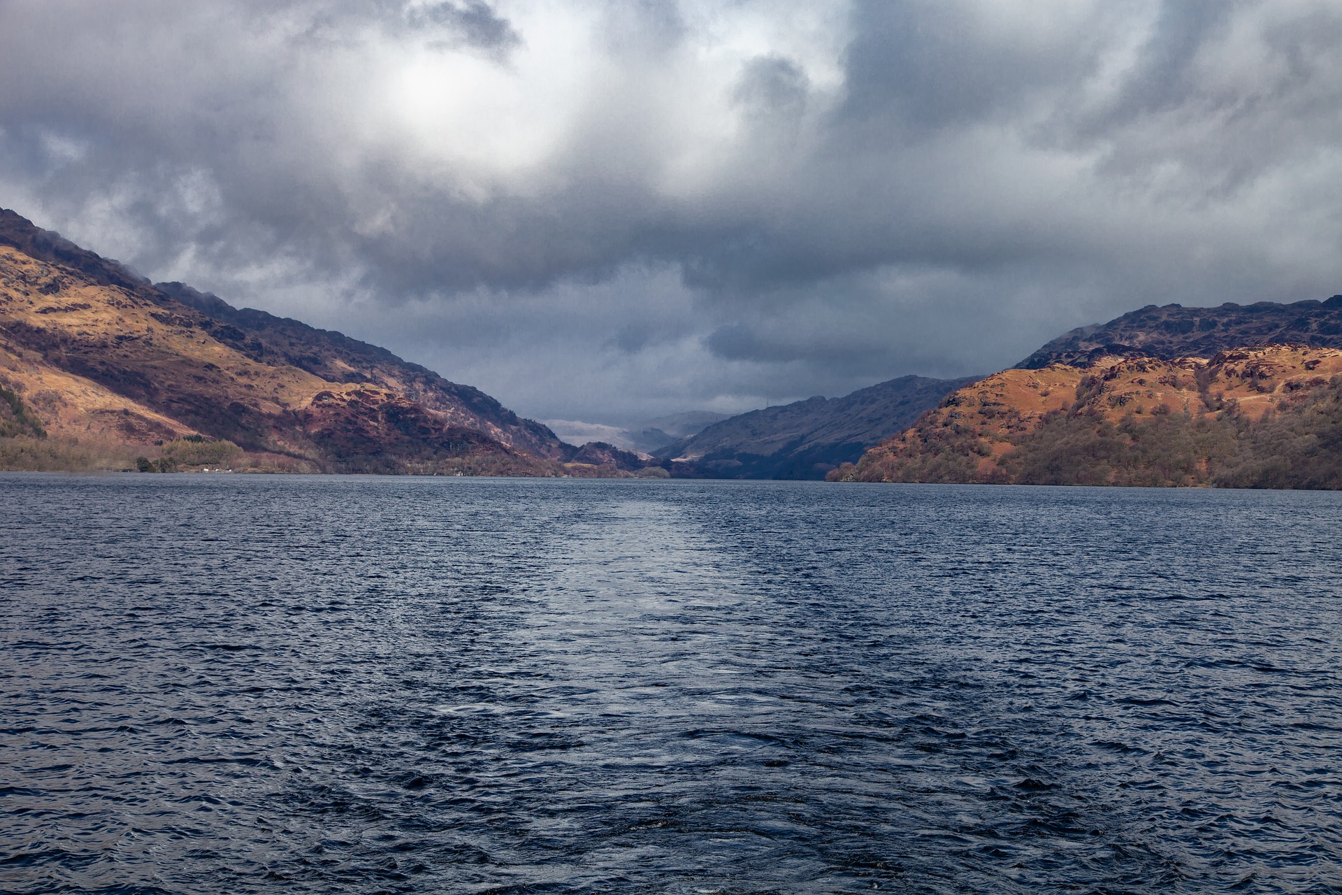 Three rescued from Loch Lomond after boat capsizes
