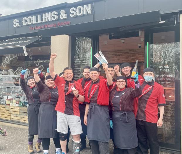 Glasgow Times: Staff at S. Collins & Son celebrate being named Britain's Best Butchers Shop.