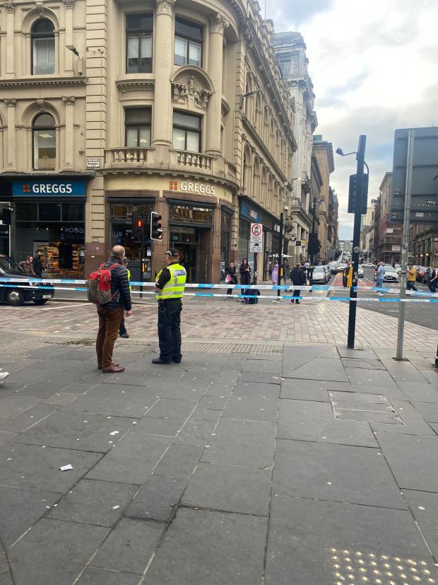 Glasgow Times: Police officers have cordoned off an area outside Central Station