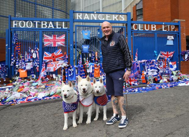 Glasgow Times: Sam Dickson from Northern Ireland with his Japanese Akita dogs