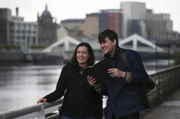 Glasgow Times: Artist Will Knight, Rachel Kacir of Glasgow City Heritage Trust by the Clyde as they map out the city for the Sulman Map Project. Pic Gordon Terris 